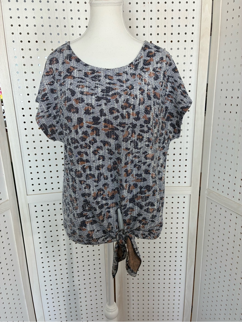 W5 sleeveless leopard print top .